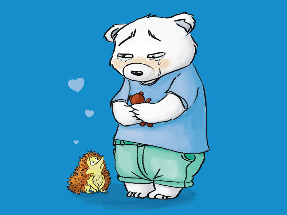 Kanda pleure en tenant son doudou, son ami hérisson à côté : accueillir la tristesse ensemble